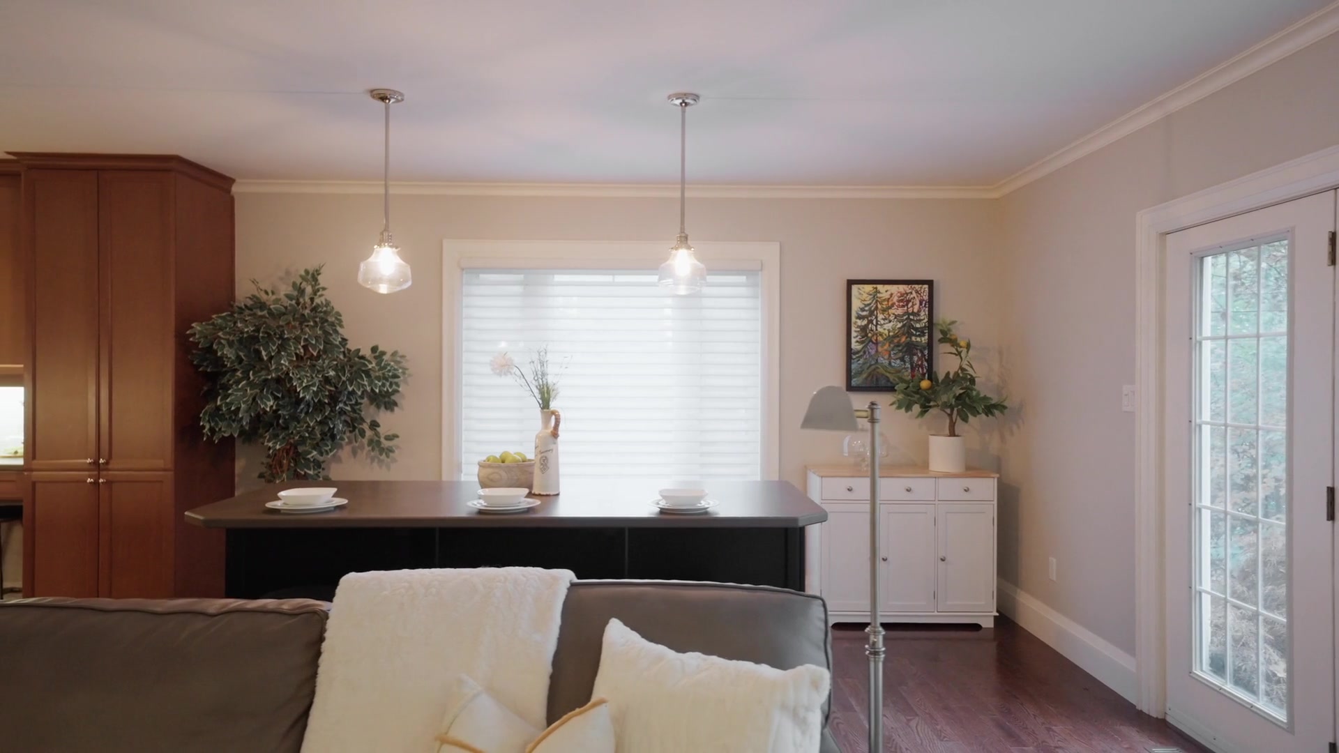 Family nook with pendants and cream sideboard