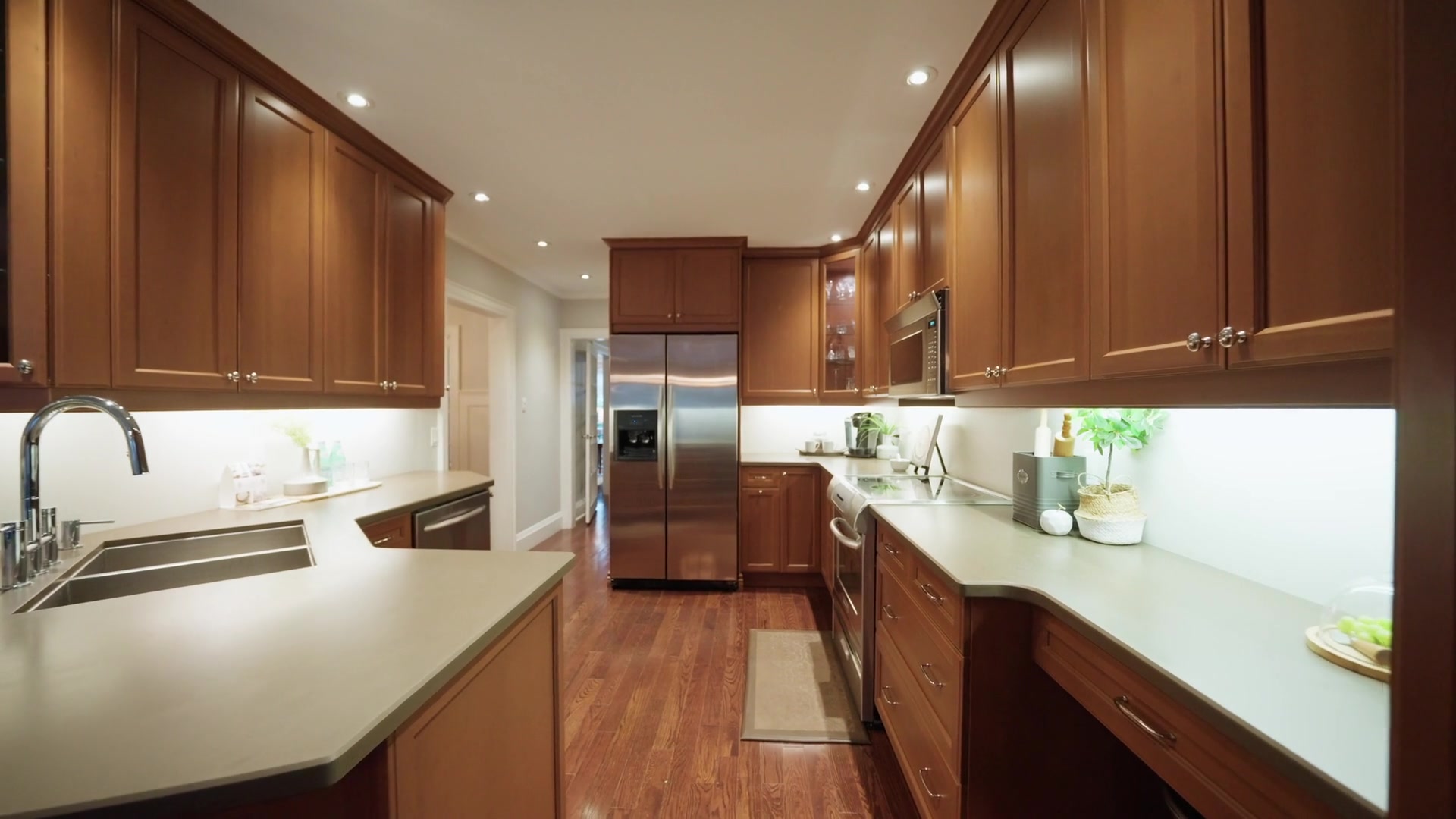 Cherry-cabinet galley kitchen with Silestone counters