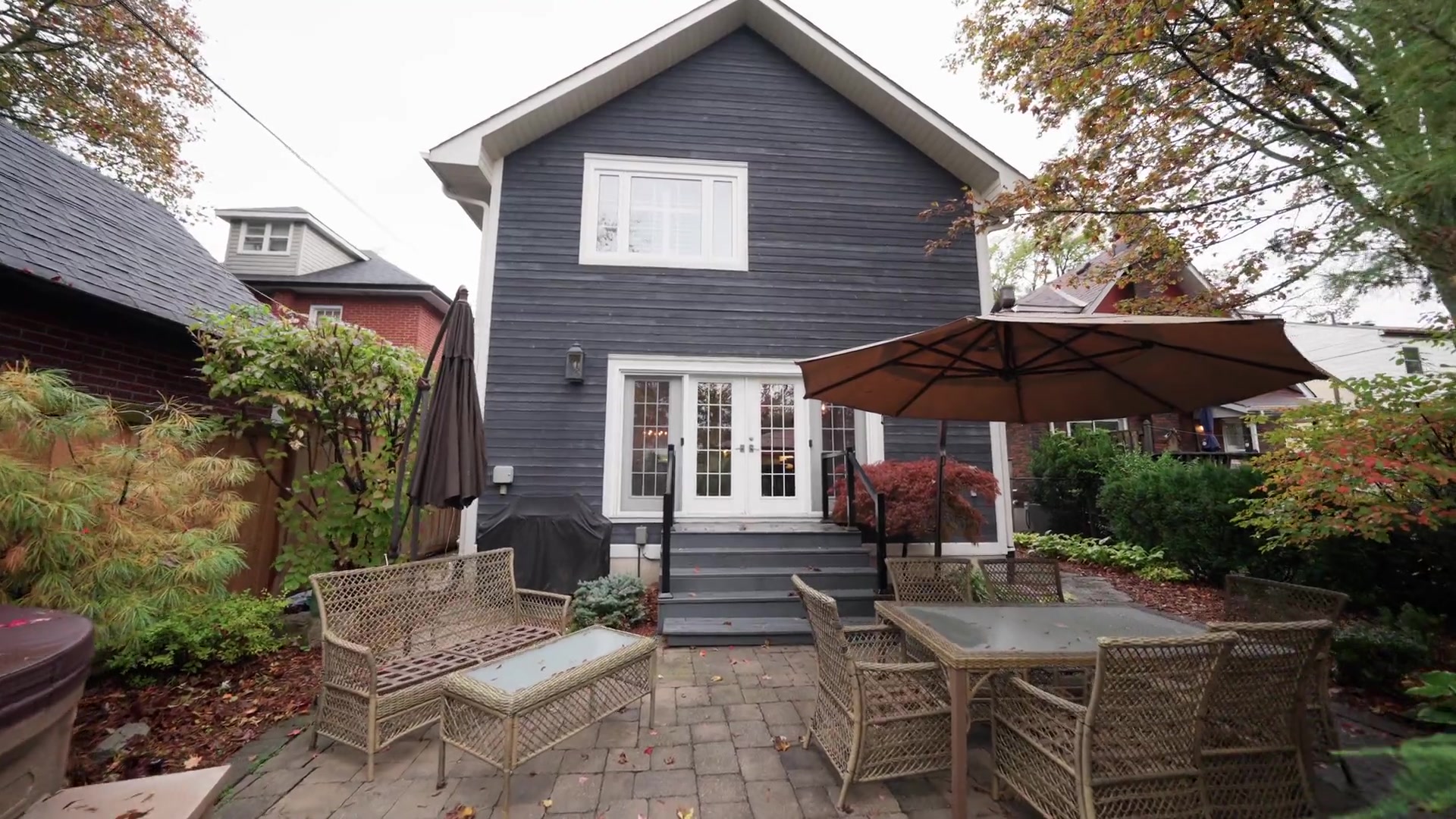 Rear facade with french doors and patio