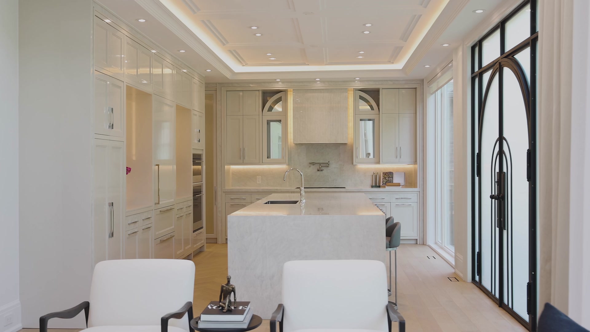 Kitchen with marble island and Wolf range