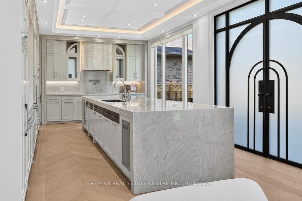 Kitchen island with arched steel door