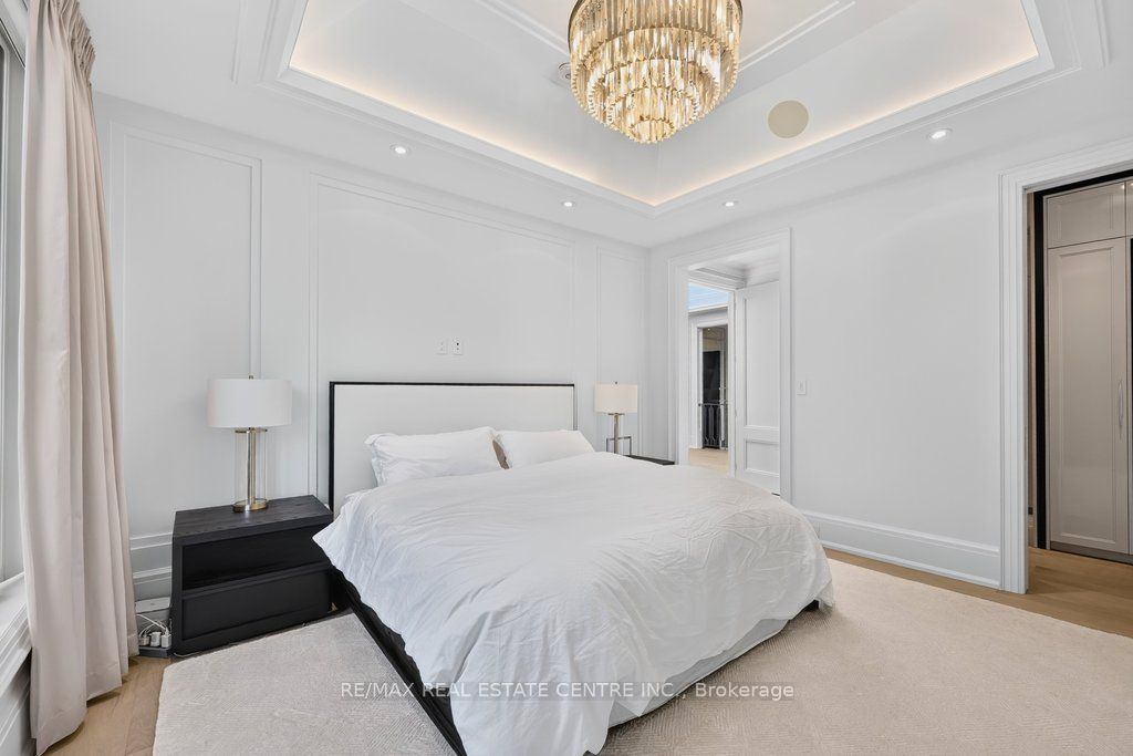 Styled primary bedroom in a Mayfield Drive residence, Oakville